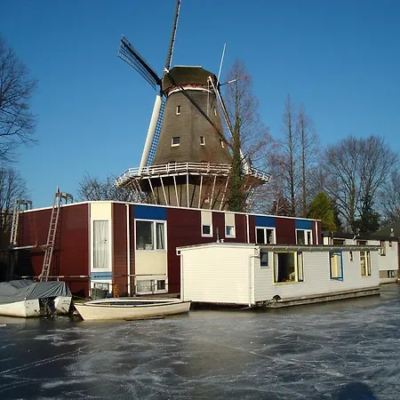 Houseboat Under The Mill Amsterdam
